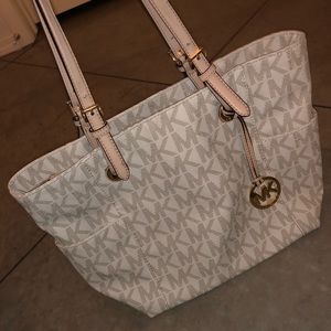 Michael Kors purse and wallet. Lightly used.